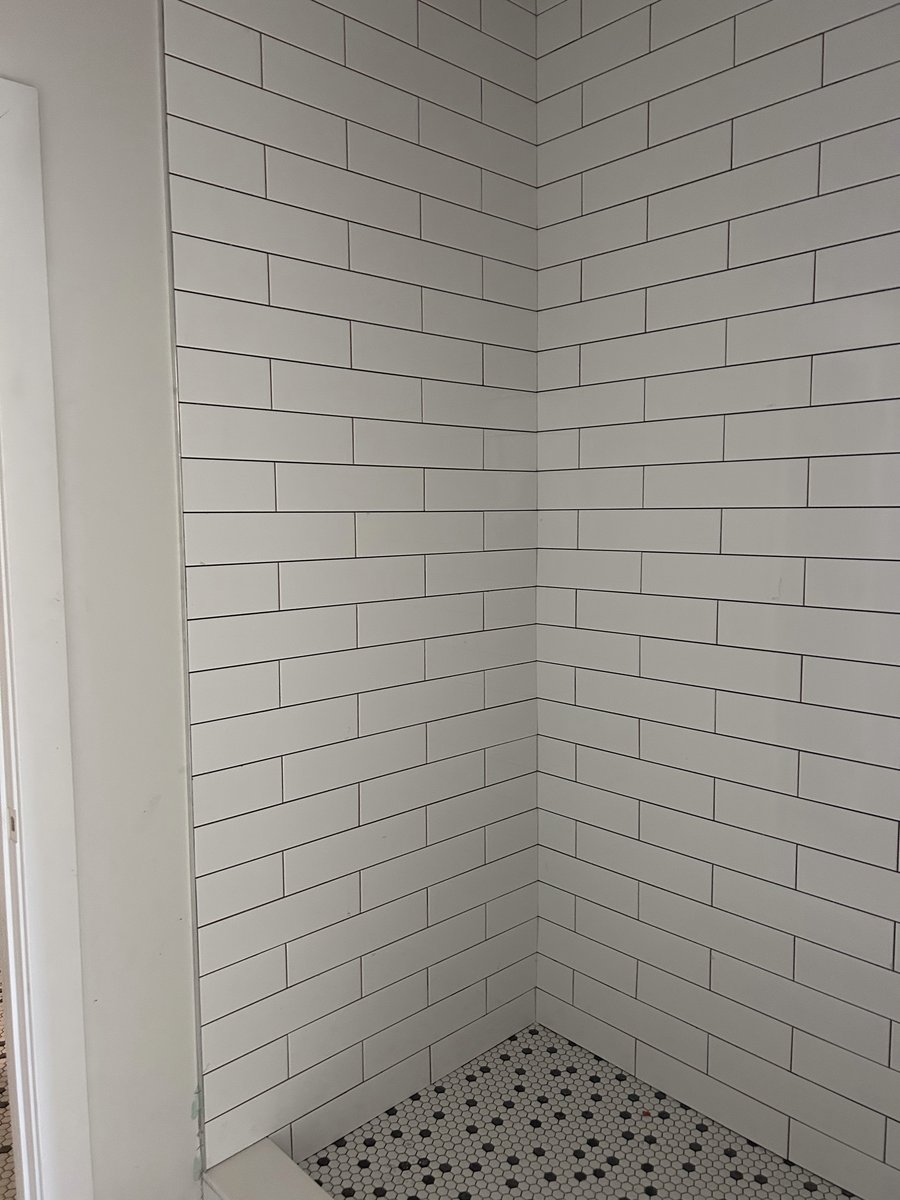 Lot 6 first floor shower with white subway tile