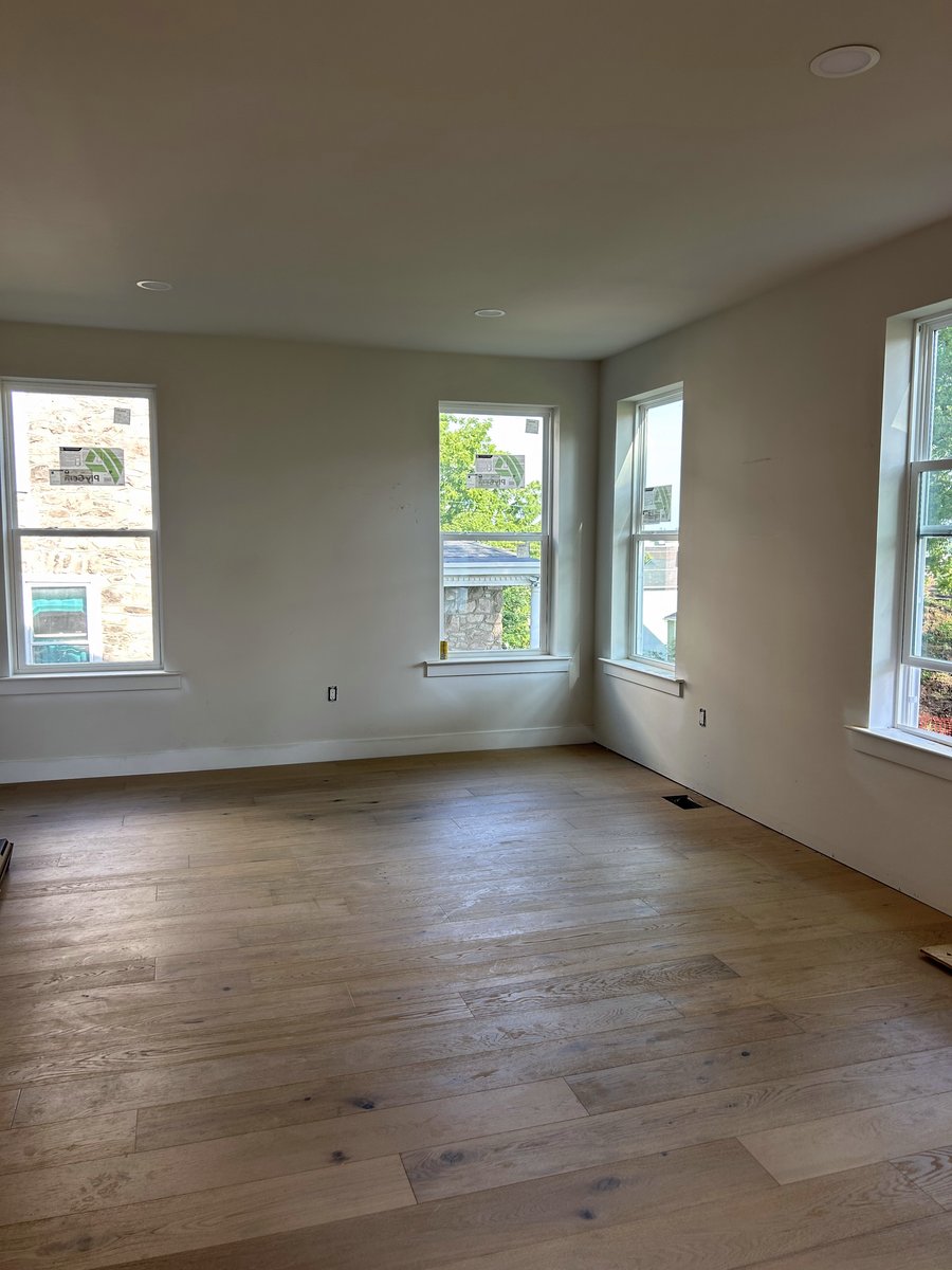 Great room with hardwood flooring installed