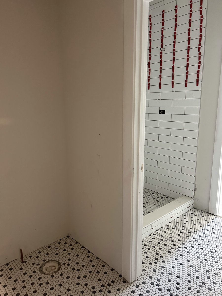 First floor bathroom with shower tile in progress